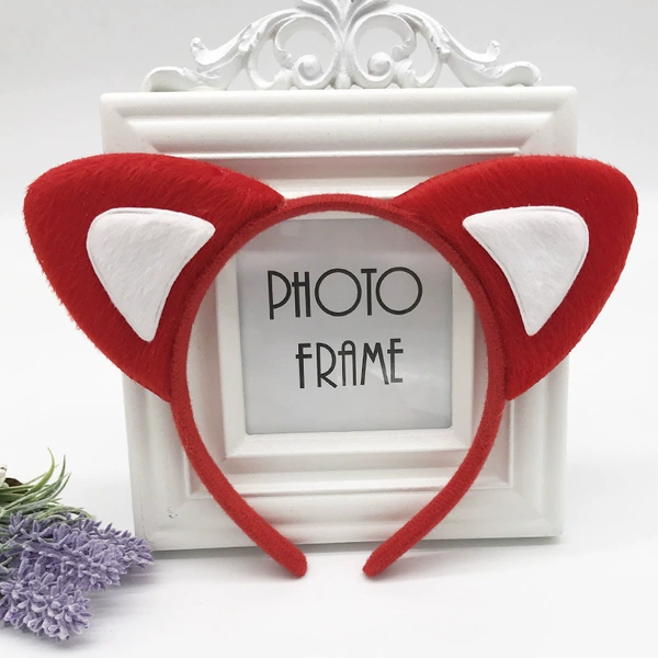 Red and white (plush) cat ears