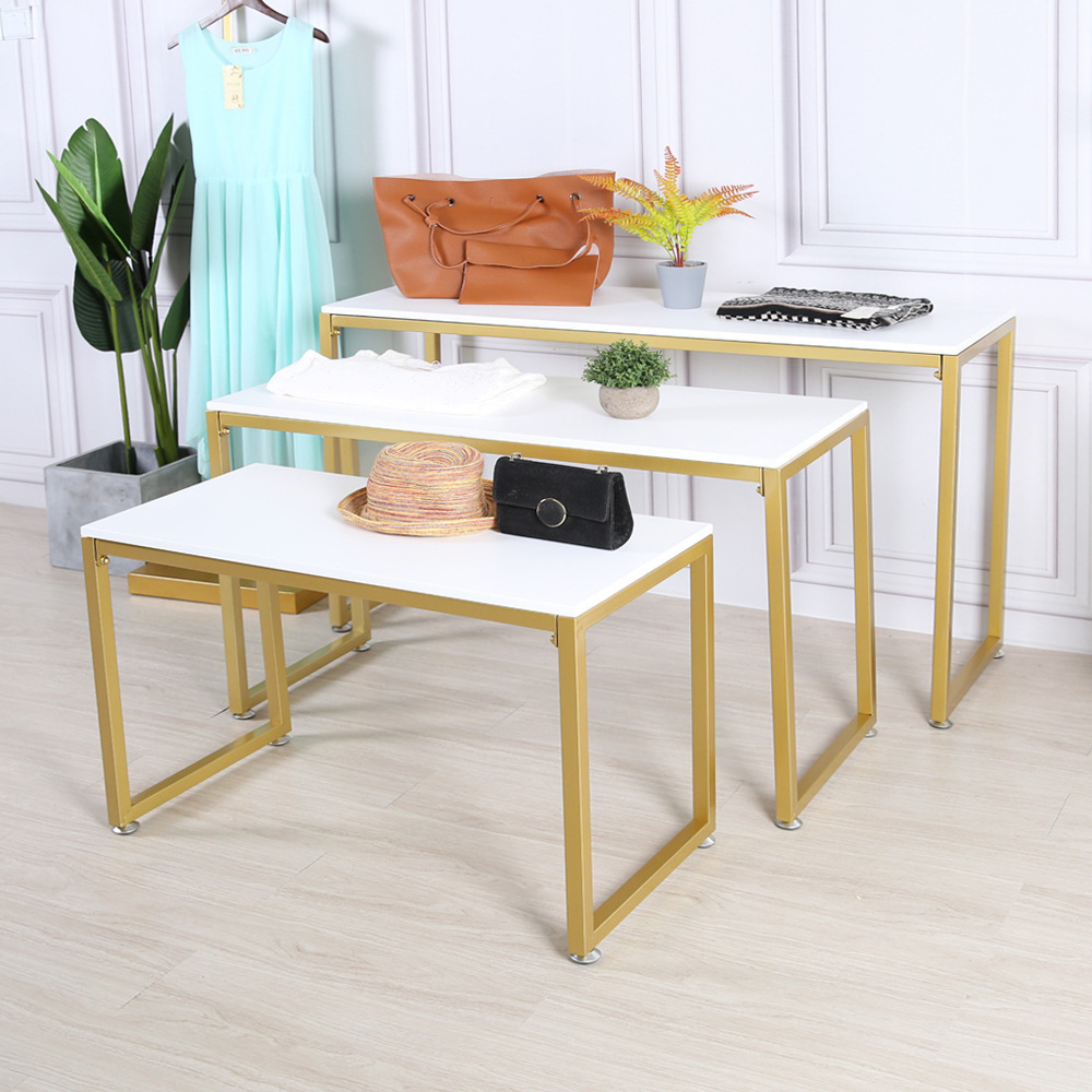Nordic gold clothing display stand iron clothing store running water table island display stand solid wood high and low table display