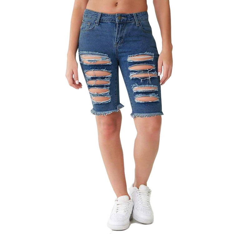 Yupeng Clothing Co., Ltd. en stock al por mayor transfronteriza e-commerce rasgado borla sexy cadera de elevación ropa de mujer Denim medio Pantalones
