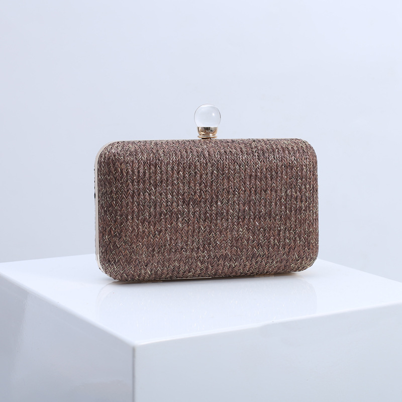 Bolso de mano creativo de verano tejido con paja para mujer, moda europea y americana, bolso de noche versátil multicolor, bolso de mujer transfronterizo con patrón de ondas de agua.