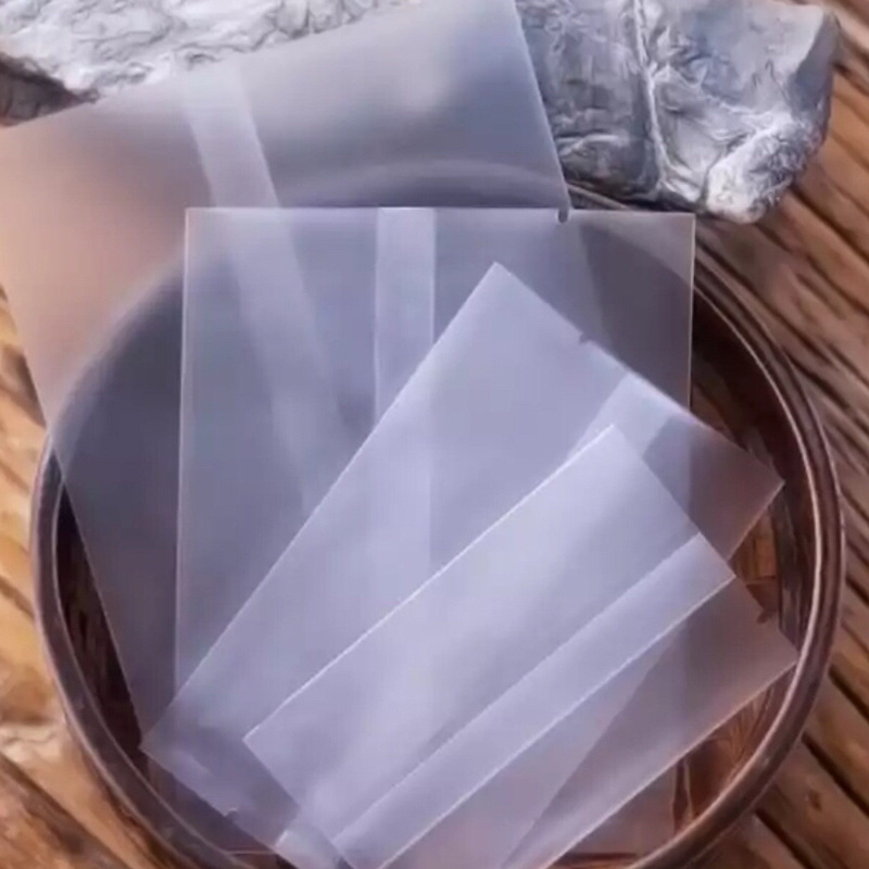 Directo de fábrica esmerilado máquina bolsa de sellado perfumado bolsa de té bolsa de embalaje de galletas dulces yema de huevo crujiente copo de nieve hecho a mano bolsa de embalaje crujiente