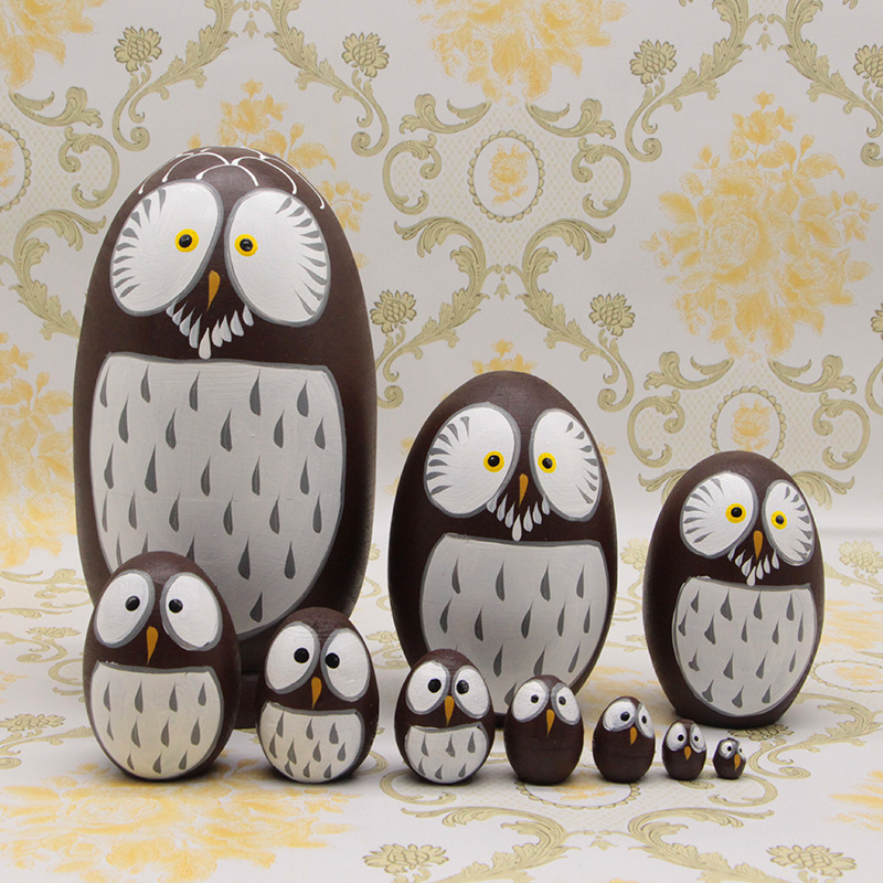 Russian nesting dolls, owl-shaped wooden toys and crafts, popular on TikTok, 5-10 layers, random colors and patterns.