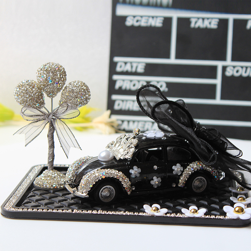 Modelo de coche, modelo de coche de arco creativo y colorido, adornos de diamantes, accesorios de interior de coche, decoración de tapete antideslizante de margarita pequeña