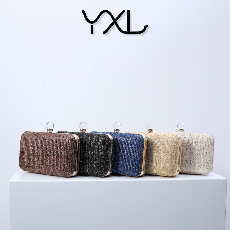 Bolso de mano creativo de verano tejido con paja para mujer, moda europea y americana, bolso de noche versátil multicolor, bolso de mujer transfronterizo con patrón de ondas de agua.