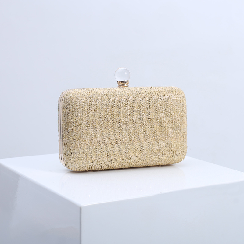 Bolso de mano creativo de verano tejido con paja para mujer, moda europea y americana, bolso de noche versátil multicolor, bolso de mujer transfronterizo con patrón de ondas de agua.