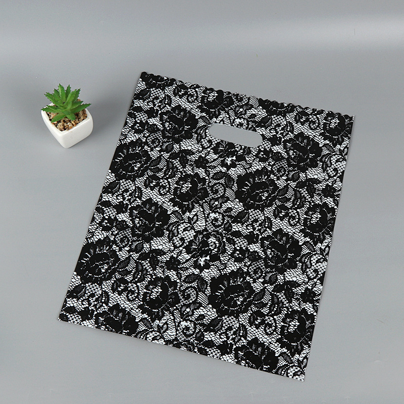 现货批发塑料袋/服装袋手提袋/礼品袋黑玫瑰特价处理服装店塑料袋