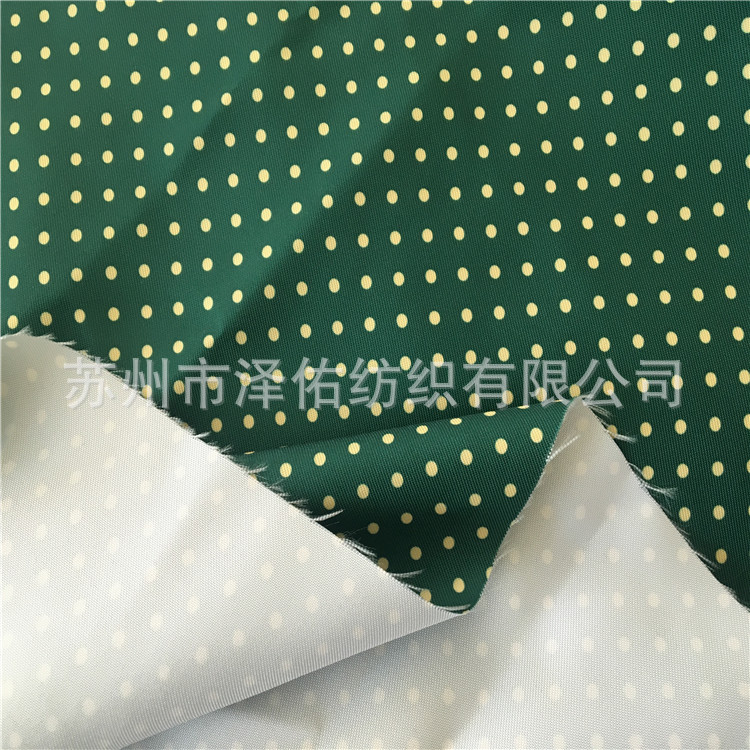 斜纹印花布斜纹华达呢圆点印花布箱包布工作服印花布