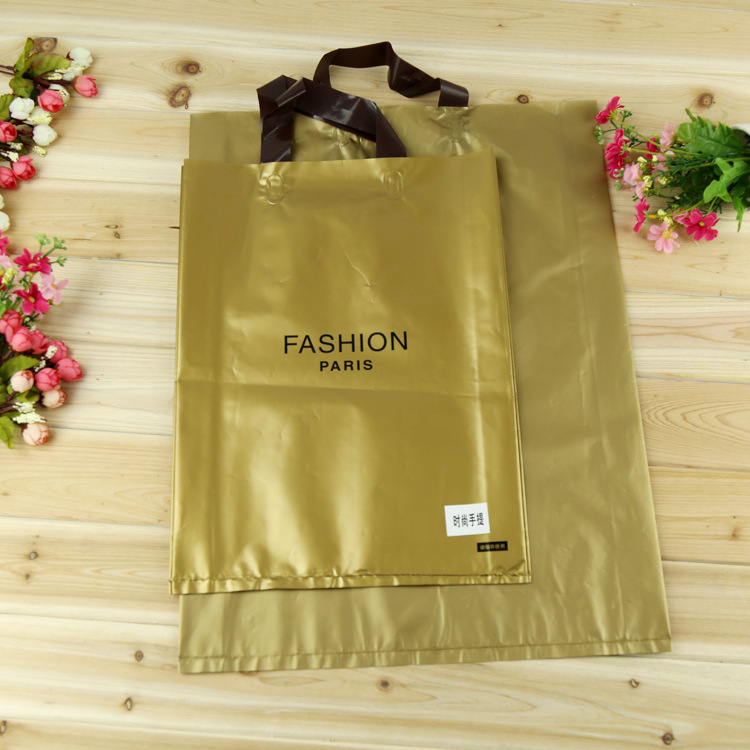 现货批发服装塑料袋/礼品袋/手提袋/时尚金手提袋/服装时尚袋加厚