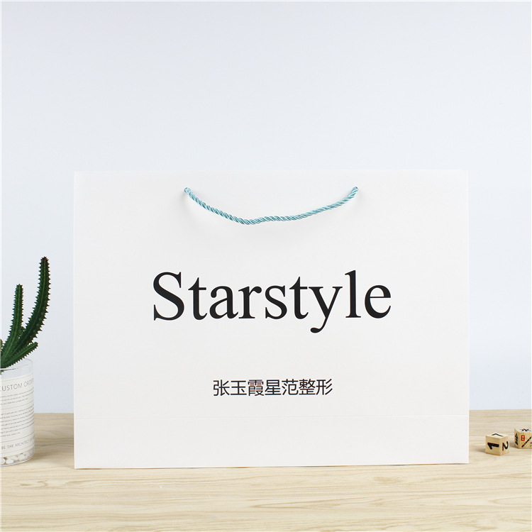 厂家批发白卡纸手提袋可logo化妆品购物礼品纸袋子包袋牛皮纸袋