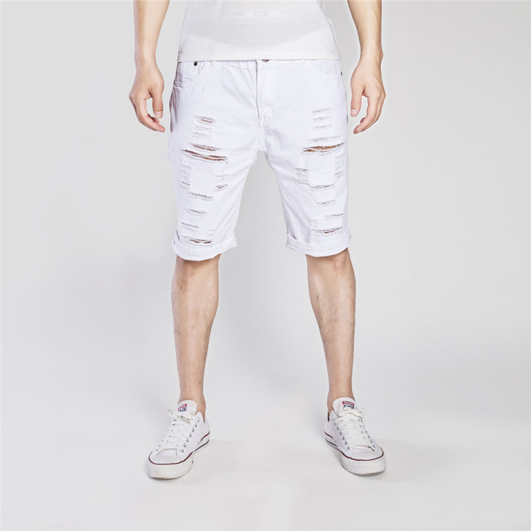 Nueva ropa de verano de comercio exterior Pantalones cortos de mezclilla de los hombres europeos y americanos rasgados desgastados casual Cruz-frontera Denim medio pantalones hf49