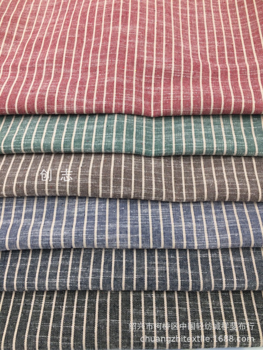 涤棉色织提花竹节条子布梭织淘现货面料女装童装提花服装面料南通