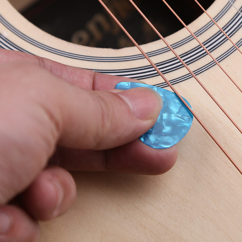 Celluloid pick, guitar pick, guitar shrapnel, folk guitar pick