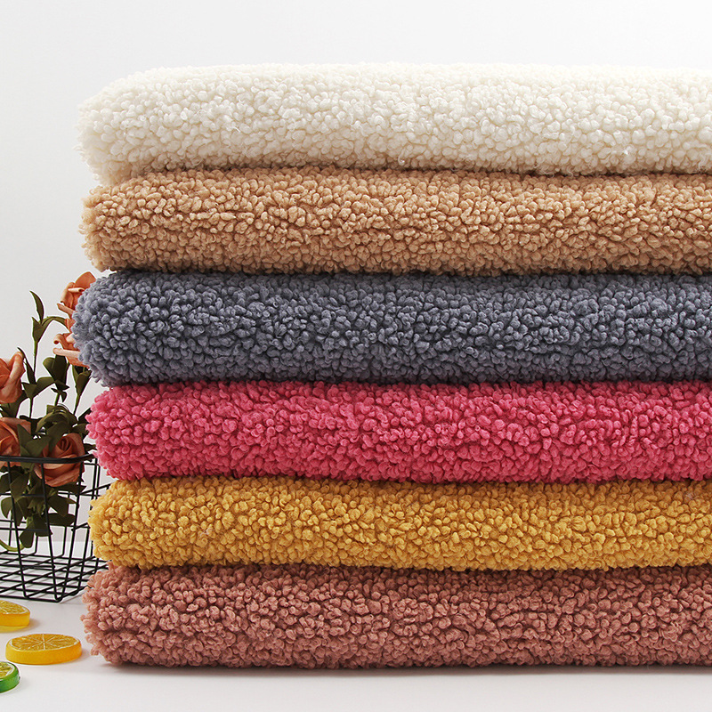 阿尔泰羊绒面料  秋冬外套冲锋衣睡衣家居服面料  素色绒布颗粒