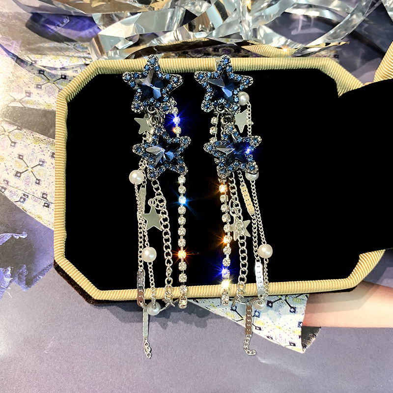 S925 aguja de plata europea y americana exagerada larga borla pendientes de moda temperamento estrella de cinco puntas pendientes de diamantes de imitación pendientes femeninos al por mayor