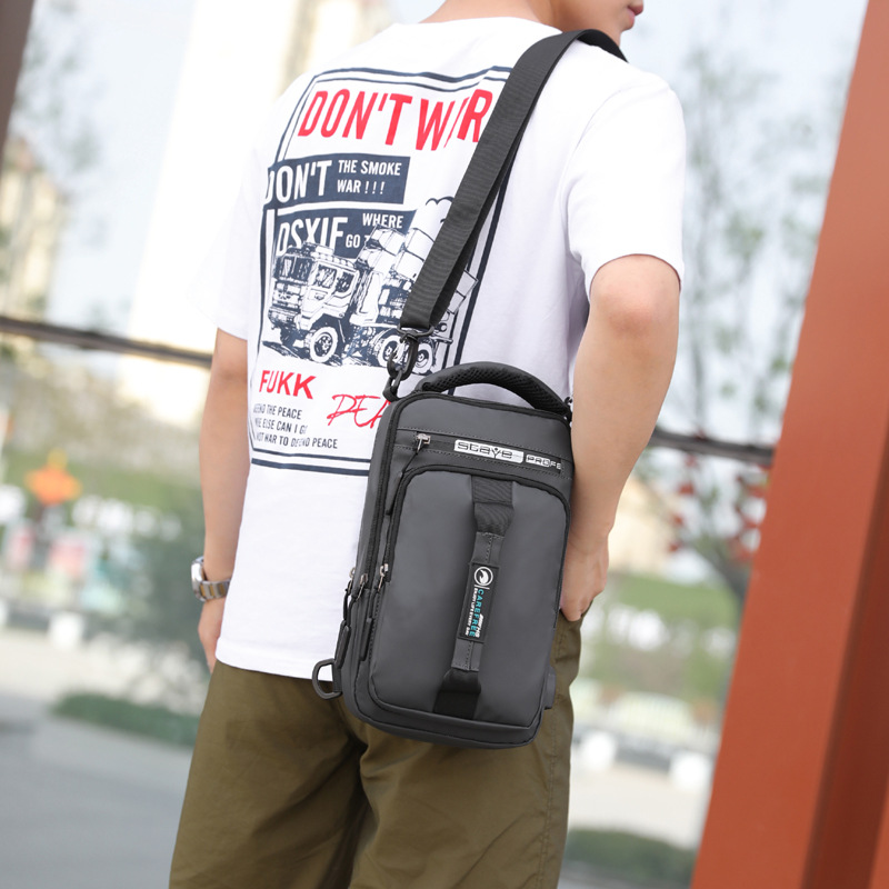 Transfronterizo exclusivo para fabricantes de lotes nuevos hombres bolsa de pecho de carga interfaz USB bolsa de pecho bolsa de hombro multifuncional mochila