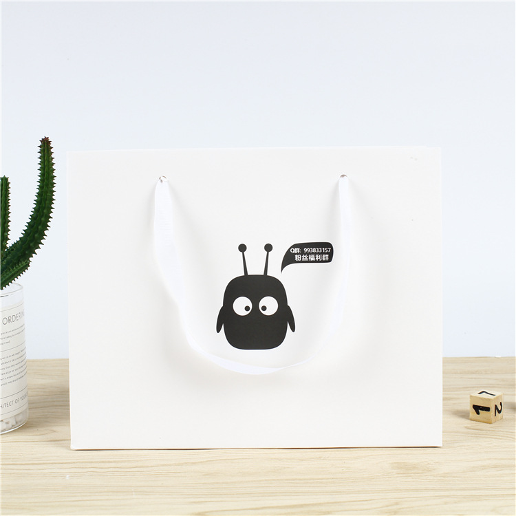 白卡礼品纸袋可印logo通用手提空白服装广告购物包装袋现货纸质