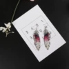 Серебристый, фиолетовый кристалл