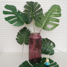 廠家直供 仿真植物家居裝飾假花葉 仿真樹葉 拍攝道具婚慶龜背葉