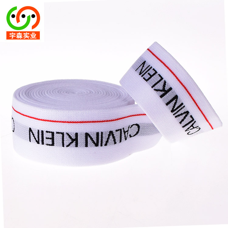 Elastic black nylon pants with letters