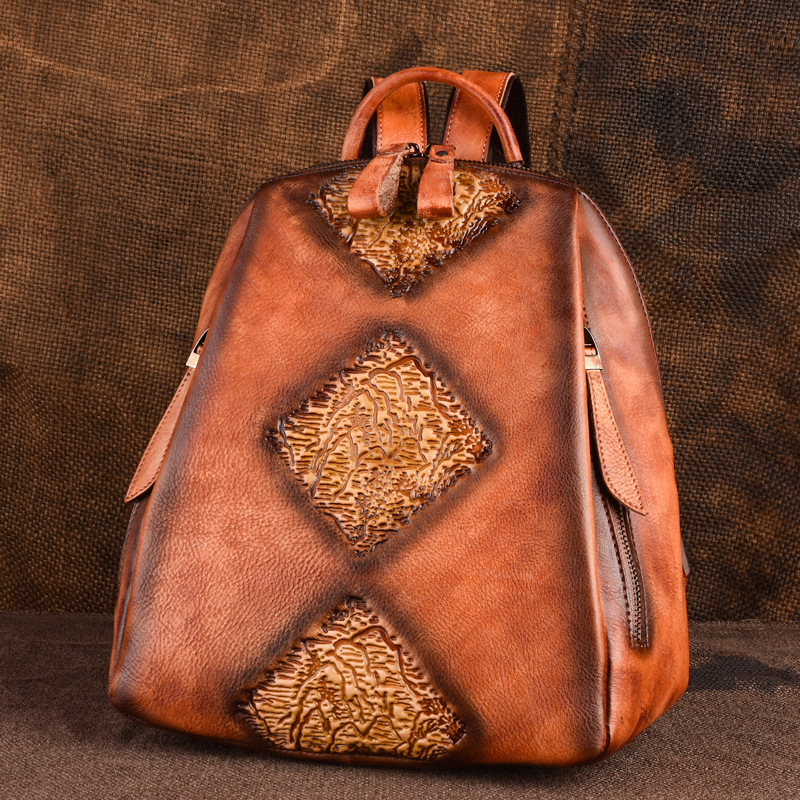 Mochila de mujer de cuero genuino curtido vegetal, multifuncional, de gran capacidad, con múltiples bolsillos, repujada, con tratamiento de color vintage, para exportación transfronteriza.