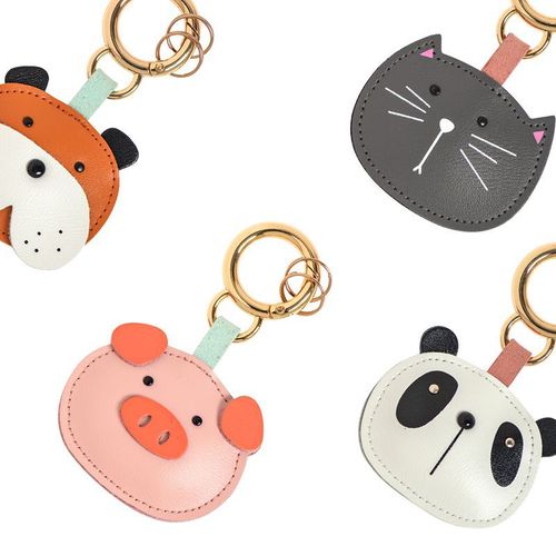 Original pig head leather car key chain bag hanging jewelry creative small gift light me warm me the same style