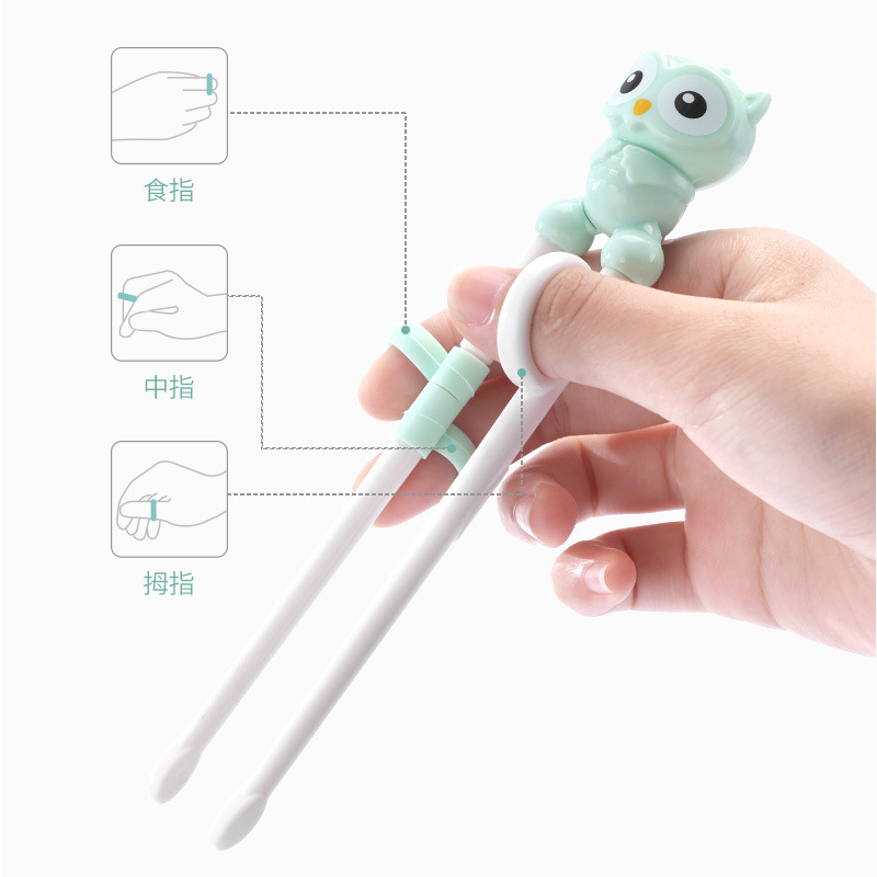 Niños pequeños aprenden palillos de dibujos animados de plástico para entrenar palillos de niños corrección de ejercicios palillos de alimentación palillos fabricantes al por mayor