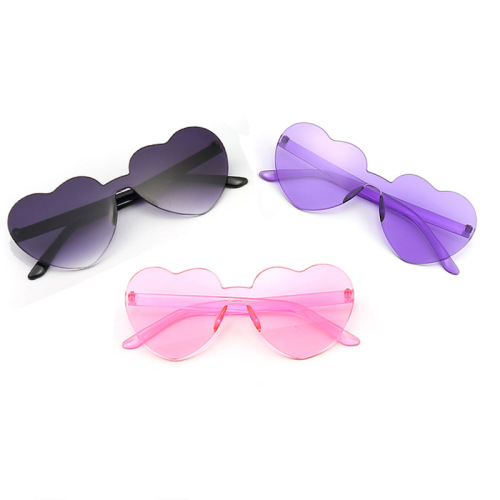 Frameless heart-shaped conjoined jelly transparent love sunglasses European and American candy color peach heart children's glasses one-piece