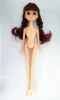 Naked baby with brown double braids with bangs