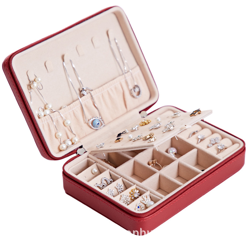 Nuevo portátil pu fresco simple Stud pendientes joyería caja cremallera anillo pendientes multifuncional joyería caja de almacenamiento al por mayor