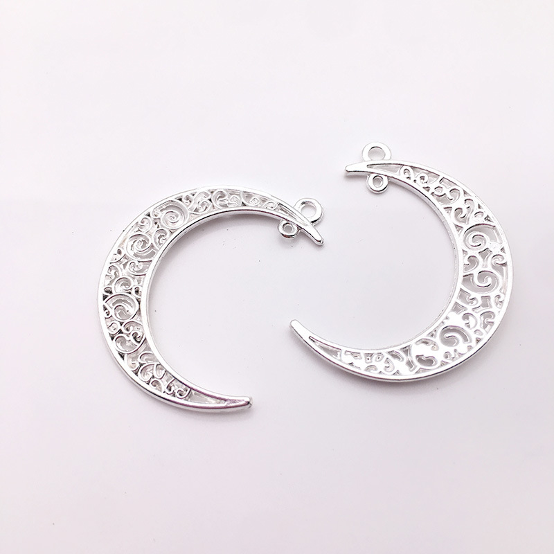 Directo de fábrica DIY accesorios de la joyería de la aleación de la vendimia Hollow Moon Star colgante material colgante hecho a mano