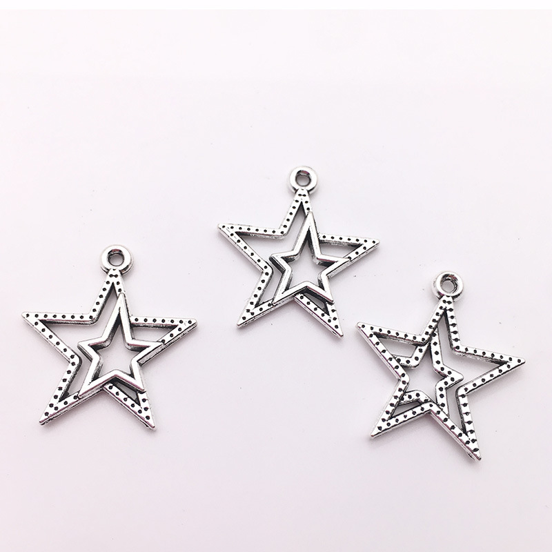 Directo de fábrica DIY accesorios de la joyería de la aleación de la vendimia Hollow Moon Star colgante material colgante hecho a mano