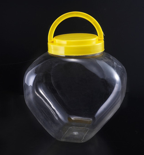 厂家直销广口塑料心形糖果罐、PET塑料炒货罐、礼品罐子