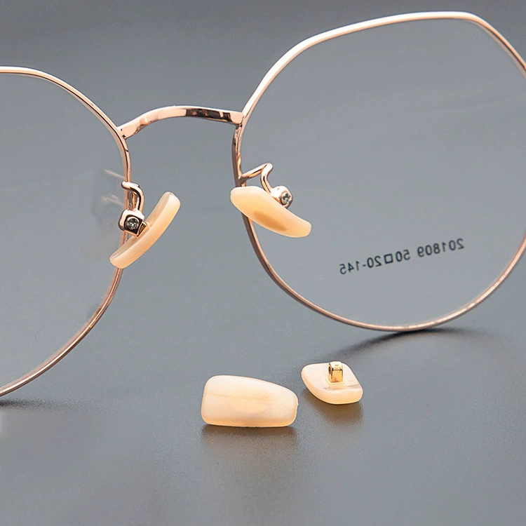 Glasses nose support with screw holes regardless of the left and right gold powder support leaf PVC plastic glasses nasal support durable hard model