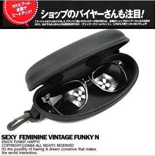 Handheld black sunglasses with zipper