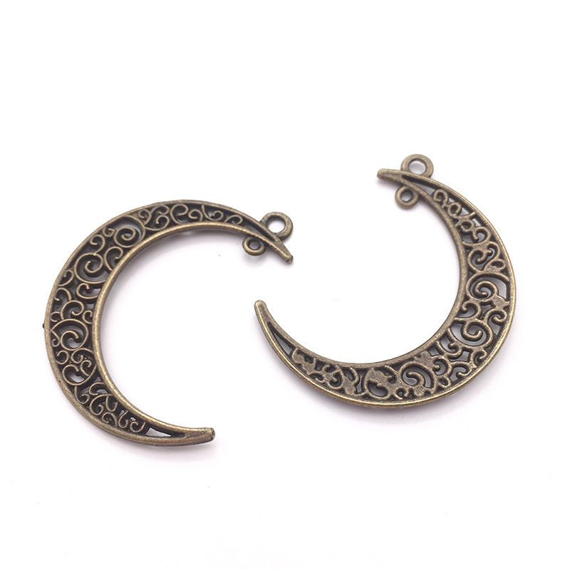 Directo de fábrica DIY accesorios de la joyería de la aleación de la vendimia Hollow Moon Star colgante material colgante hecho a mano