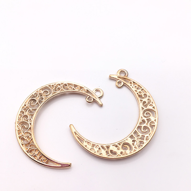 Directo de fábrica DIY accesorios de la joyería de la aleación de la vendimia Hollow Moon Star colgante material colgante hecho a mano