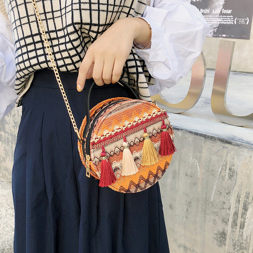 Ins super popular small round bag for women, new summer trendy and versatile ethnic style tassel woven crossbody bag