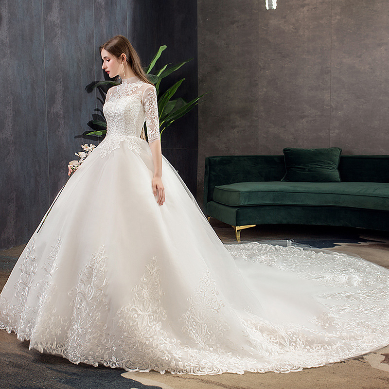 Vestido de novia principal al por mayor 2025, nuevo estilo, vestido de novia con cola larga, estilo bosque, entallado, cuello alto, manga media TD39.