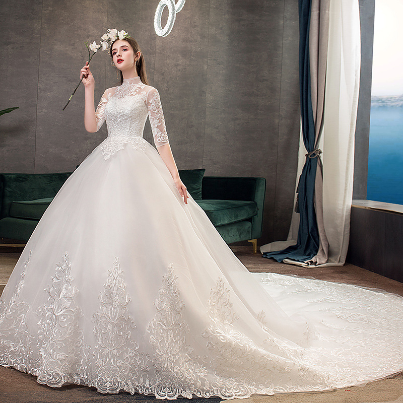 Vestido de novia principal al por mayor 2025, nuevo estilo, vestido de novia con cola larga, estilo bosque, entallado, cuello alto, manga media TD39.