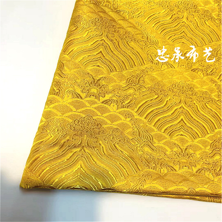 金黄海浪云纹古风提花真丝织锦缎口金包服装面料包经布佛堂用布料