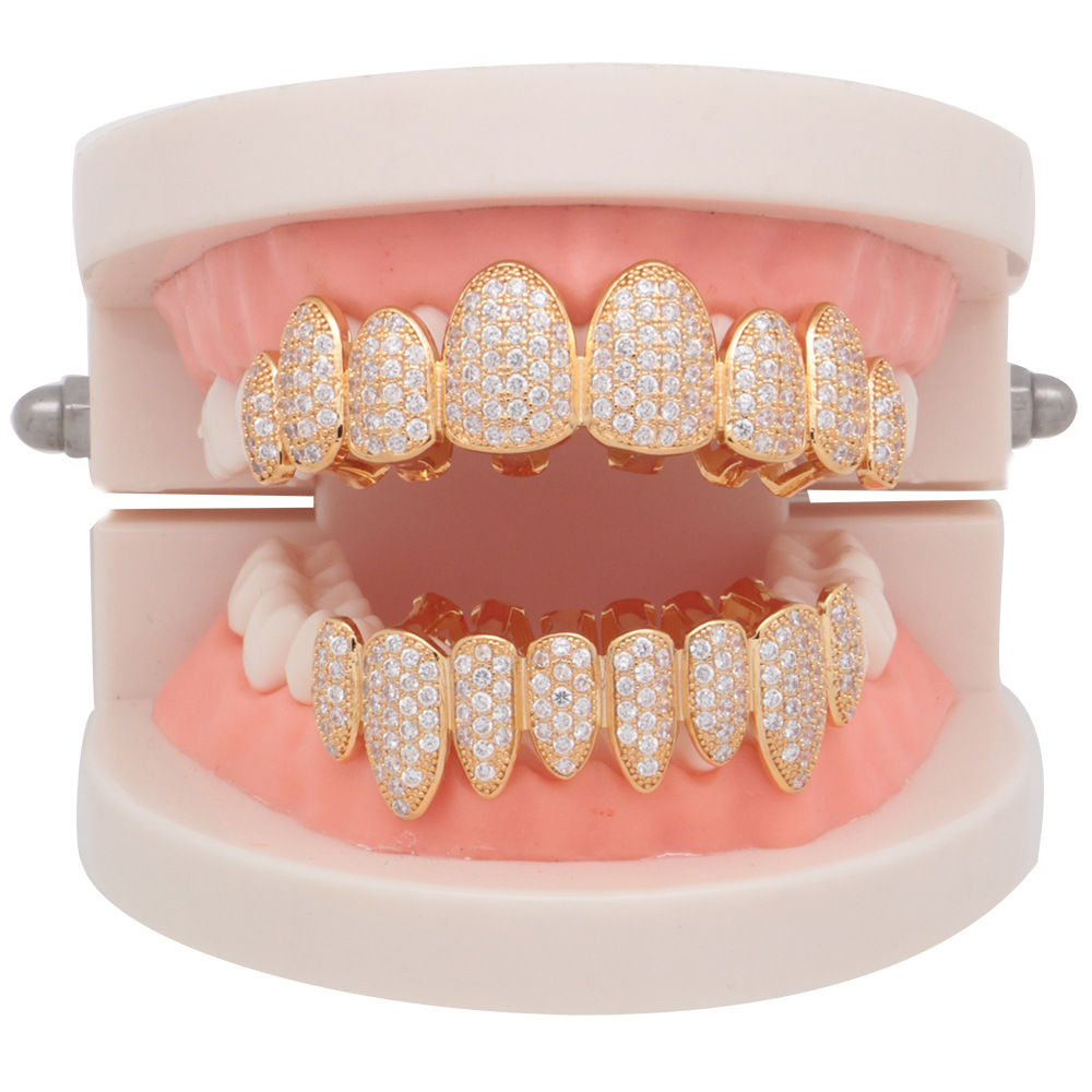 Tirantes irregulares de hip hop de ocho dientes para hombres y mujeres 18K micro incrustaciones 4A ZIRCON chapado en oro vampiro dientes falsos Halloween