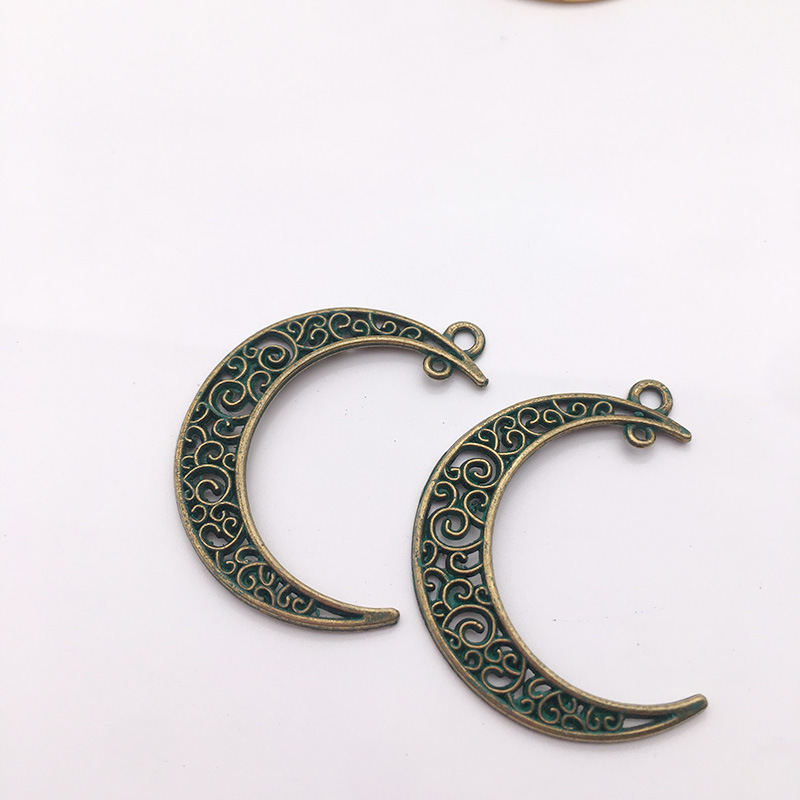 Directo de fábrica DIY accesorios de la joyería de la aleación de la vendimia Hollow Moon Star colgante material colgante hecho a mano