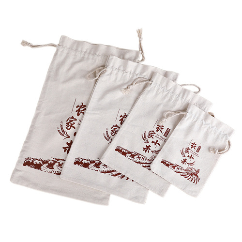 In-stock cloth rice bags: 5-pound millet bags, 10-pound rice packaging bags, and bulk wholesale canvas flour bags with drawstring closures.