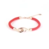 Golden red rope bracelet stainless steel, pink gold