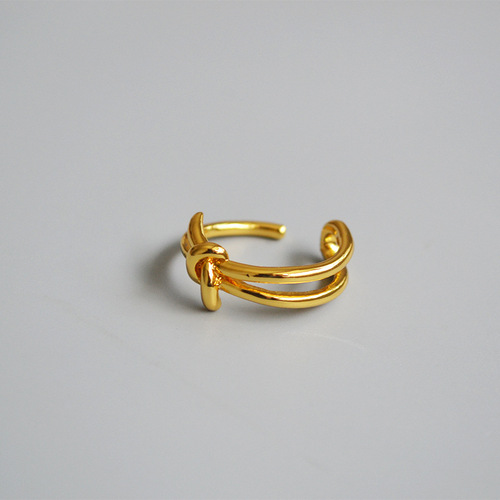 Elegant and Minimalist Celie Style Fashion Ring with Knot Openwork and Gold Plating, Made of Brass for a Trendy and Charming Look