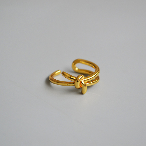 Elegant and Minimalist Celie Style Fashion Ring with Knot Openwork and Gold Plating, Made of Brass for a Trendy and Charming Look