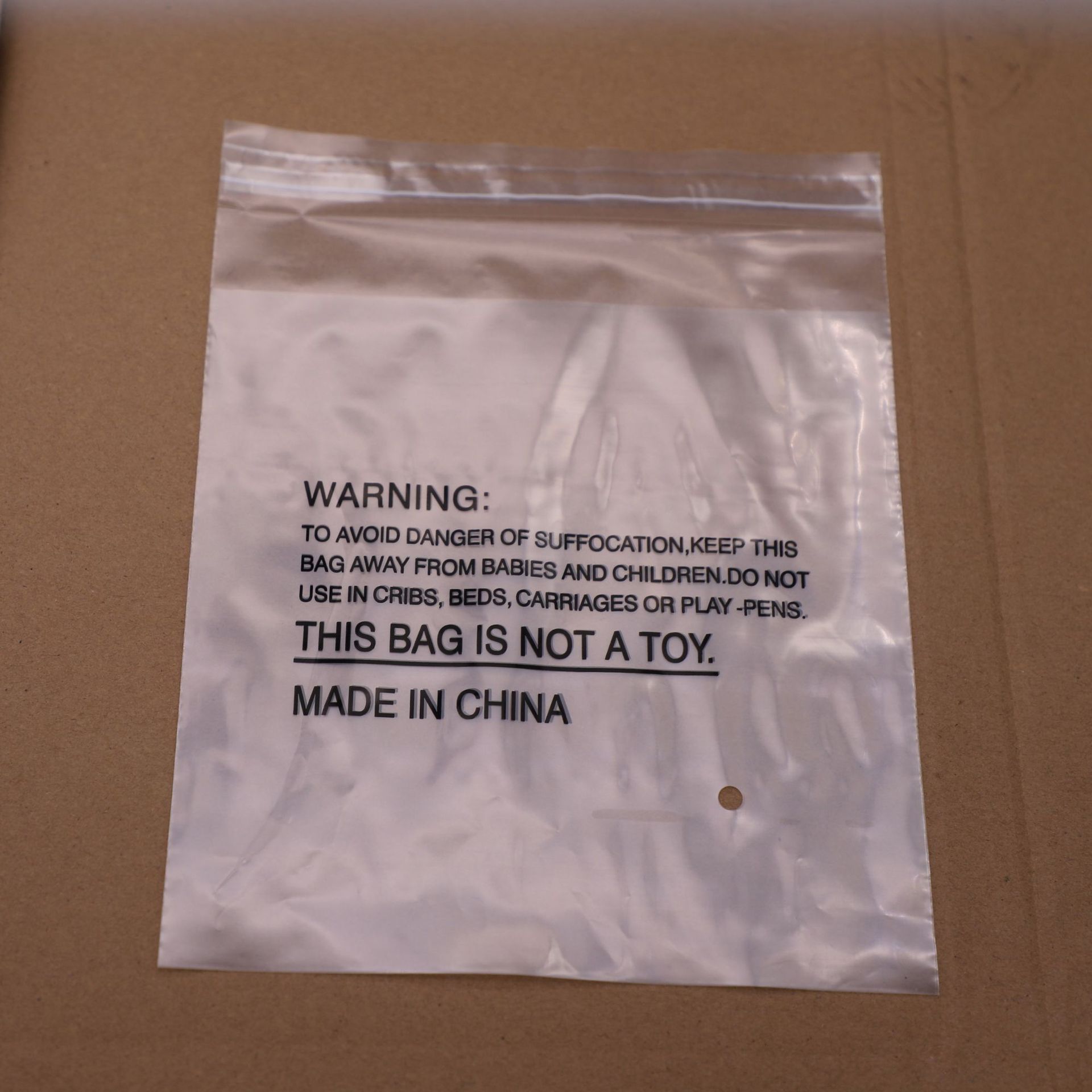 批发LDPE高压软膜警示语塑料袋防套头窒息警告语服装饰品玩具袋