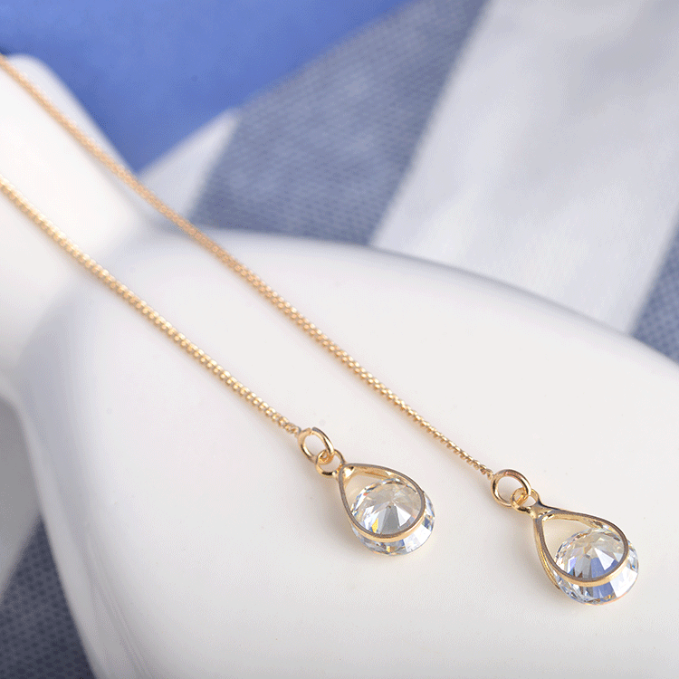 Asymmetrical earrings with zircon drop-shaped with tassels