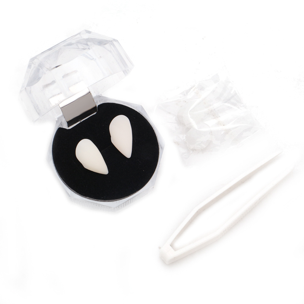 Halloween vampiro dientes falsos Zombie dientes falsos con pinzas de mordedor pequeño tigre dientes tirantes resina colmillos traje