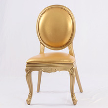 金色PU皮欧式婚礼餐椅 一体成型树脂仿木椅 优质酒店婚庆宴会椅子